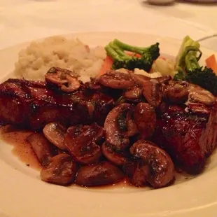 three flames special steak with sauteed mushrooms and garlic mashed potatoes