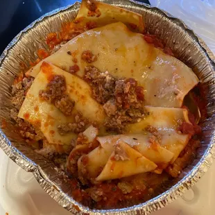 This is considered lasagna by these three guys. Tastes worse than it looks.