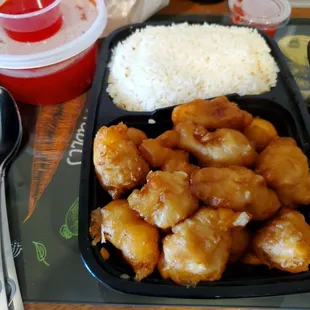 Sweet sour chicken with just a few pineapple and green pepper under the chicken sorry forgot to take a picture of that.