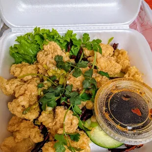 a takeout container of food