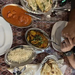 Garlic naan, butter chicken and vegetable jalfretz