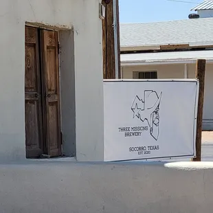 a sign on the side of a building