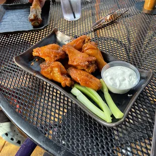 Wings, bleu cheese and celery.