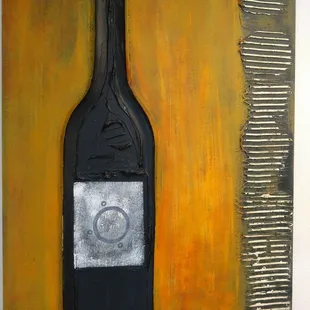 a bottle of wine on a yellow background