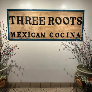This is the sign to the entrance of the restaurant