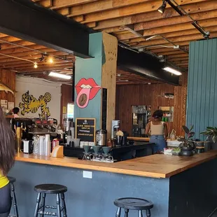 a woman standing at the counter