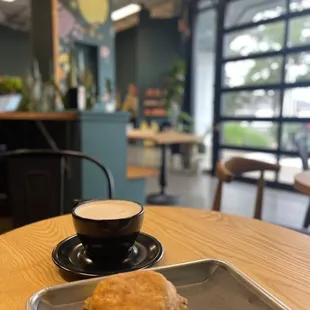 a biscuit and a cup of coffee