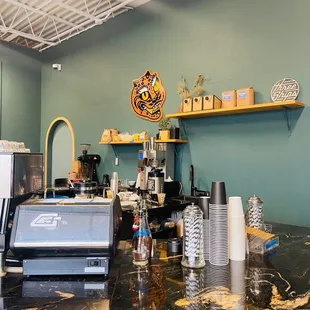 a counter with a coffee maker