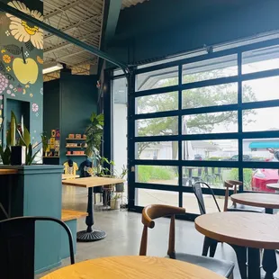 tables and chairs in a coffee shop