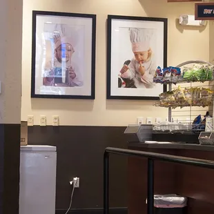 a kitchen with a counter and a refrigerator