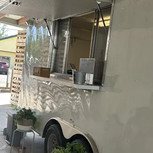 a coffee truck parked in a parking lot