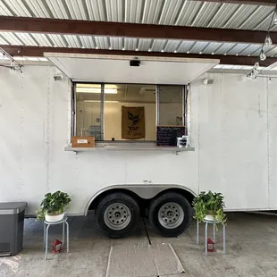a food truck parked in a garage