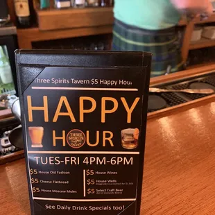 a happy hour sign