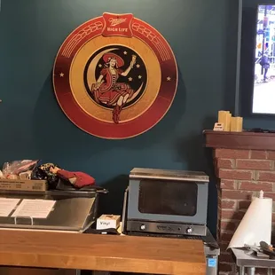 a bar with a television in the background