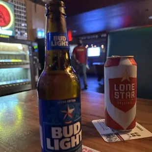 a bud light beer and a can of bud light