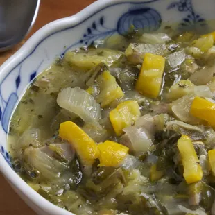 Chicken vegetable soup with squash.