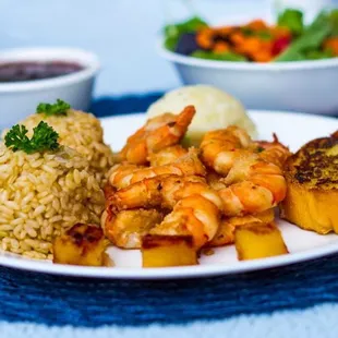a plate of food and a bowl of salad