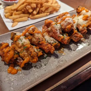 BFG Wings- baked, fried, then grilled wings available in many flavors