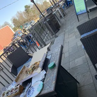 Lovely patio, plus overflow outdoor seating in the road, with pizza pub pizza and beer flight!