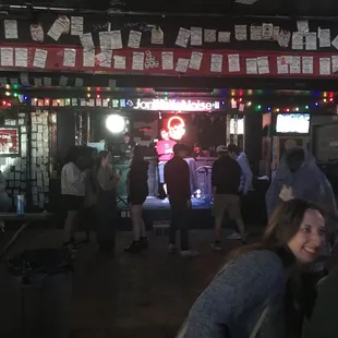 a crowd of people at a bar