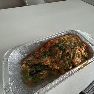 Turkey leg with crawfish etouffee.