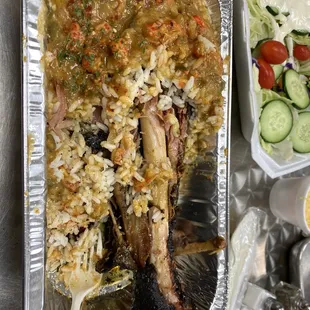 a tray of rice and vegetables