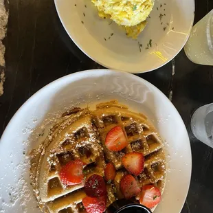Scrambled eggs  waffles  strawberries