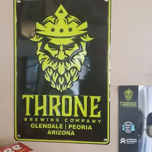 a beer sign and a cd