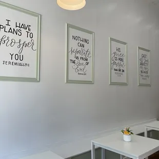 Inspirational quotes on the wall in the seating area.