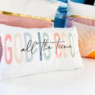 a pillow with the words god is good all the time