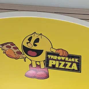 a smiley face holding a slice of pizza