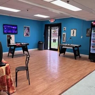 a game room with a pool table