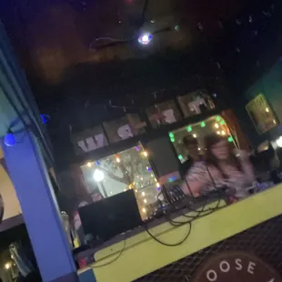 a group of people sitting at a bar