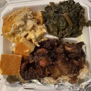 Oxtail with collard greens, mac &amp; cheese, and cornbread