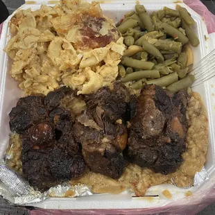 Oxtails w/ mac n cheese &amp; green beans &amp; potatoes