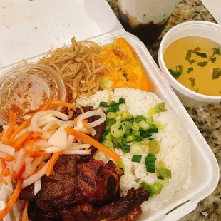 a meal in a styrofoam container