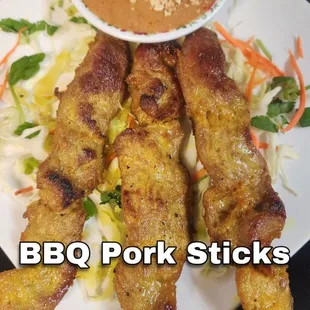 BBQ Pork Sticks served with delicious peanut sauce.