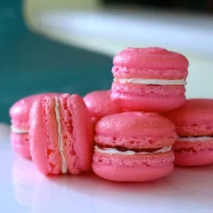 a stack of pink macarons