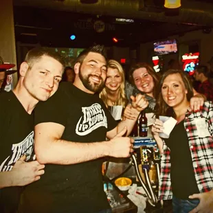a group of friends at a bar