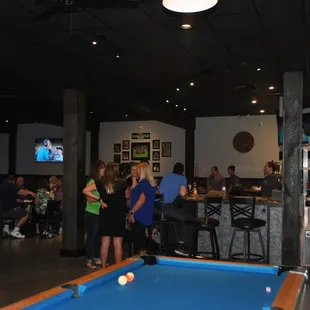 a pool table with a pool ball on it