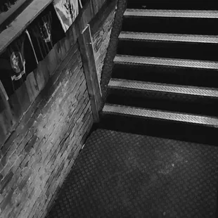 a black and white photo of a set of stairs
