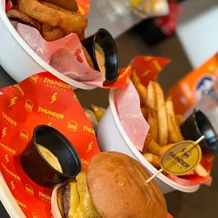 a hamburger and fries on a table
