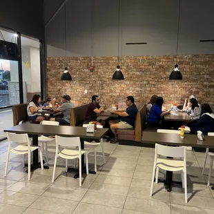 a group of people sitting at a table