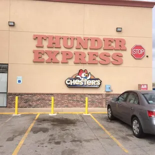 a car parked in front of a building