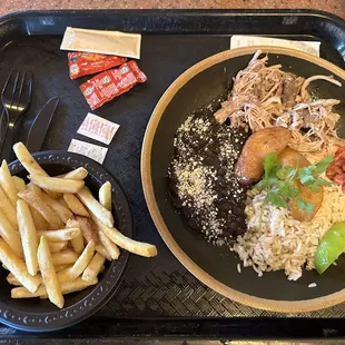 a plate of food and fries