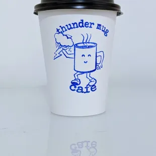 a cup of coffee on a table