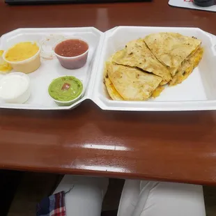 Chicken quesadilla with no black olives and added side of queso...Yum!
