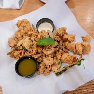 fried shrimp with a side of dipping sauce