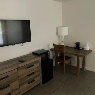 TV, dresser, and table.