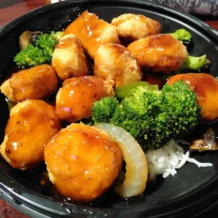 Delicious General Tso rice bowl! Everything I've eaten here is so good! Free fireworks show and concert tonight. Place is packed!